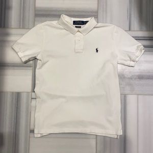 White Ralph Lauren polo; Ralph Lauren logo on left chest; Kids medium 10-12